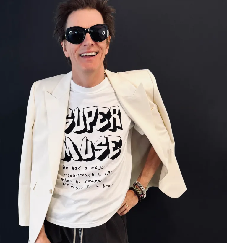 Photo courtesy of Patty Palazzo Duran Duran John Taylor wearing Super Muse tshirt